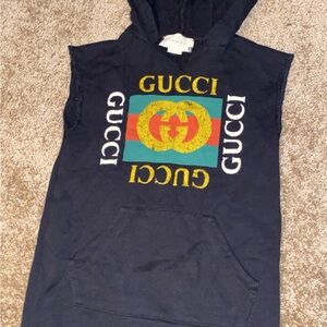 Girls hooded gucci dress( no sleeves). Worn only once. Price negotiable!
